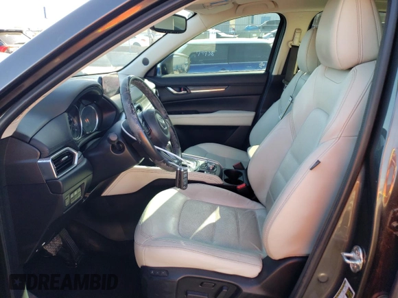 2018 Mazda CX-5 Grand Touring with VIN JM3KFADMXJ1323646, listed as a Copart auction lot 46857825 with 62,262 mi miles and Salvage title. Bid and sale history available at DreamBid. Image 7.
