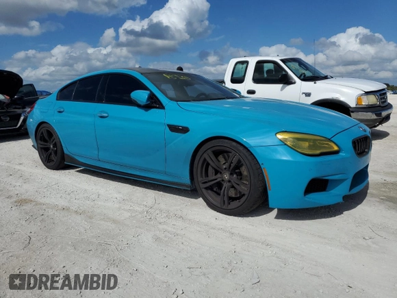 2016 BMW M6 z VIN WBS6E9C51GG437085, wystawiony jako Copart lot #78982124 z przebiegiem Nie podano mil oraz Szkody całkowita. Historia ofert i sprzedaży dostępna na DreamBid. Obrazek 4.