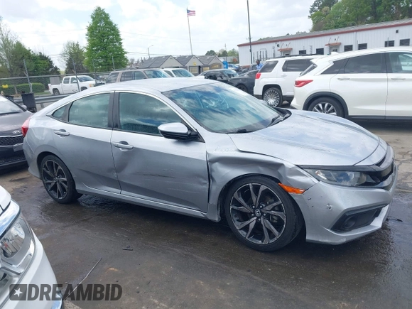 2021 Honda Civic Sport with VIN 2HGFC2F88MH530214, listed as a IAAI auction lot 41968361 with 60,869 mi miles and . Bid and sale history available at DreamBid. Image 13.