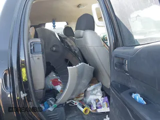 2016 Toyota Tundra 4WD Truck SR with VIN 5TFUM5F16GX064418, listed as a IAAI auction lot 41504912 with 215,241 mi miles. Bid and sale history available at carsss.com. Image 8.