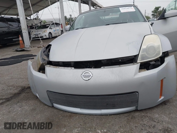 2006 Nissan 350Z Touring with VIN JN1AZ36A36M450659, listed as a IAAI auction lot 42034870 with 77,544 mi miles. Bid and sale history available at carsss.com. Image 6.