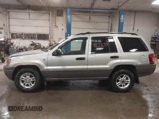 2004 Jeep Grand Cherokee Laredo with VIN 1J4GW48S44C321869, listed as a IAAI auction lot 41822099 with 181,663 mi miles. Bid and sale history available at carsss.com. Image 14.