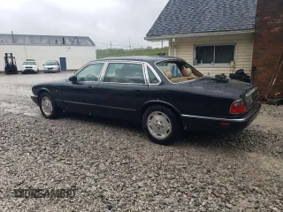 1997 Jaguar XJ with VIN SAJHX6248VC806189, listed as a Copart auction lot 57891035 with 51,654 mi miles and Salvage title. Bid and sale history available at DreamBid. Image 2.