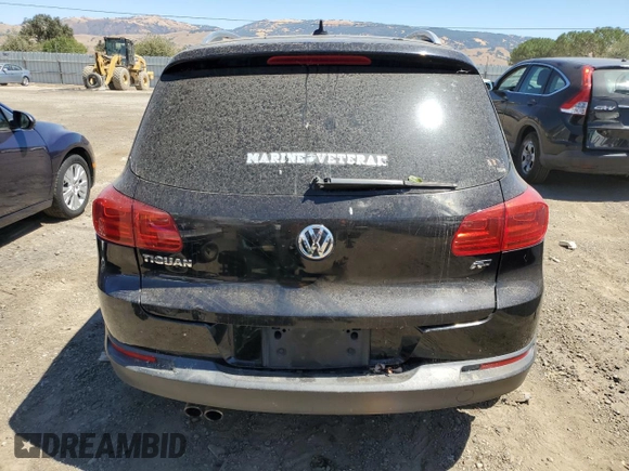 2013 Volkswagen Tiguan SE with VIN WVGAV3AX9DW574114, listed as a Copart auction lot 67578024 with Not provided miles and Non repairable. Bid and sale history available at DreamBid. Image 6.