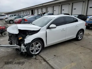 2015 Volvo S60 T5 Drive-E Premier with VIN YV140MFBXF1312468, listed as a Copart auction lot 84048144 with 139,979 mi miles and Salvage Title. Bid and sale history available at carsss.com. Image 1.