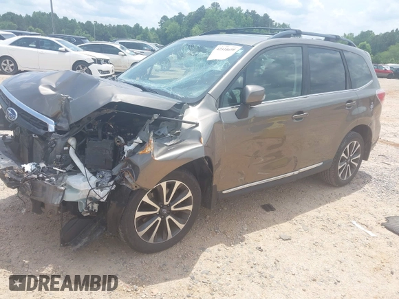 2017 Subaru Forester Touring with VIN JF2SJGWCXHH558789, listed as a IAAI auction lot 42518698 with 112,294 mi miles and . Bid and sale history available at DreamBid. Image 17.