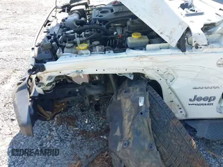 2019 Jeep Wrangler Unlimited Sahara with VIN 1C4HJXEN5KW509806, listed as a IAAI auction lot 42071325 with 95,549 mi miles and . Bid and sale history available at DreamBid. Image 6.