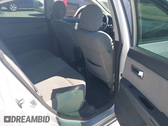 2012 Nissan Sentra S with VIN 3N1AB6AP9CL720114, listed as a IAAI auction lot 42730343 with 144,919 mi miles and . Bid and sale history available at DreamBid. Image 8.