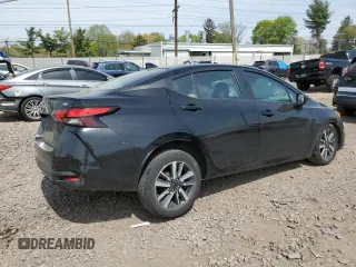 2021 Nissan Versa SV z VIN 3N1CN8EV2ML834848, wystawiony jako Copart lot #54125065 z przebiegiem 87 176 mil mil oraz Szkoda całkowita • Salvage title. Historia ofert i sprzedaży dostępna na DreamBid. Obrazek 3.