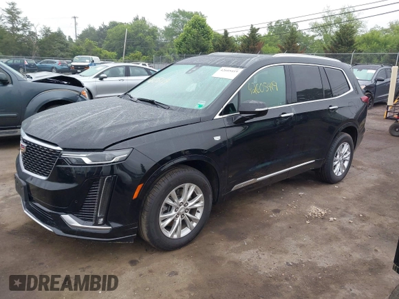 2024 Cadillac XT6 AWD Luxury with VIN 1GYKPBR45RZ750986, listed as a IAAI auction lot 42605419 with 50,929 mi miles and . Bid and sale history available at DreamBid. Image 18.
