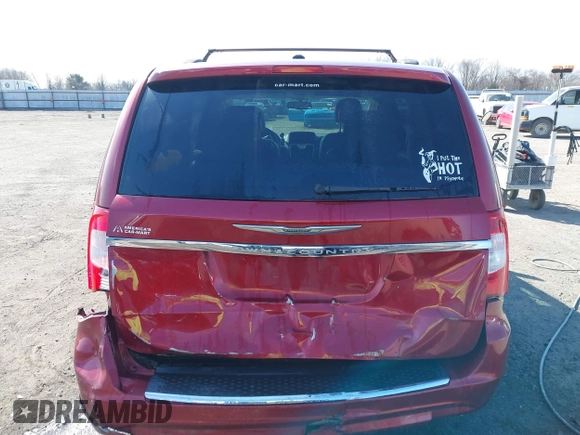 2013 Chrysler Town & Country Touring z VIN 2C4RC1BG7DR777172, wystawiony jako IAAI lot #41780881 z przebiegiem 196 768 mil mil oraz . Historia ofert i sprzedaży dostępna na DreamBid. Obrazek 16.