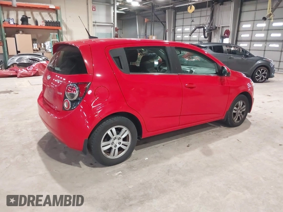 2014 Chevrolet Sonic LT with VIN 1G1JC6SB1E4125174, listed as a IAAI auction lot 41521991 with 125,490 mi miles. Bid and sale history available at carsss.com. Image 4.
