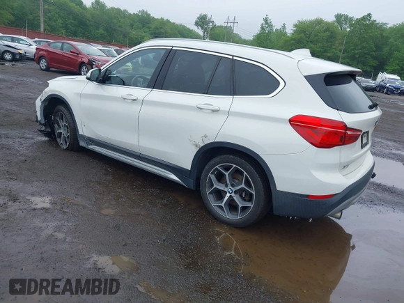 2018 BMW X1 xDrive28i with VIN WBXHT3C38J5L31322, listed as a IAAI auction lot 42260190 with 70,266 mi miles and . Bid and sale history available at DreamBid. Image 3.