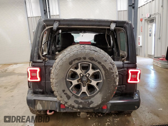 2018 Jeep Wrangler Unlimited Rubicon z VIN 1C4HJXFG0JW113054, wystawiony jako Copart lot #55884355 z przebiegiem Nie podano mil oraz Szkoda całkowita • Salvage title. Historia ofert i sprzedaży dostępna na DreamBid. Obrazek 6.