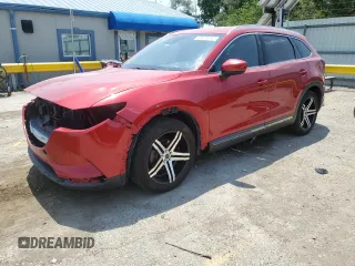 2016 Mazda CX-9 Grand Touring with VIN JM3TCADY6G0105783, listed as a Copart auction lot 63975195 with 135,972 mi miles and Salvage title. Bid and sale history available at DreamBid. Image 1.