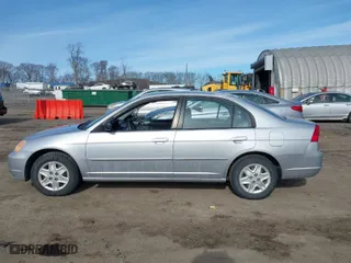 2003 Honda Civic LX with VIN 2HGES16683H505013, listed as a IAAI auction lot 41617324 with 70,728 mi miles. Bid and sale history available at carsss.com. Image 15.