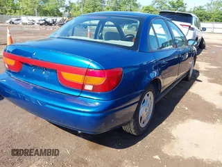 2002 Saturn SL with VIN 1G8ZK52742Z289921, listed as a IAAI auction lot 42340896 with 165,328 mi miles and . Bid and sale history available at DreamBid. Image 4.