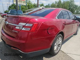2013 Ford Taurus Limited with VIN 1FAHP2F88DG131171, listed as a Copart auction lot 60704625 with 175,016 mi miles and Clean title. Bid and sale history available at DreamBid. Image 4.