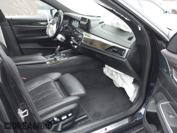 2018 BMW 6 Series 640i xDrive with VIN WBAJV6C55JBK07051, listed as a IAAI auction lot 41505732 with 96,172 mi miles and . Bid and sale history available at carsss.com. Image 5.