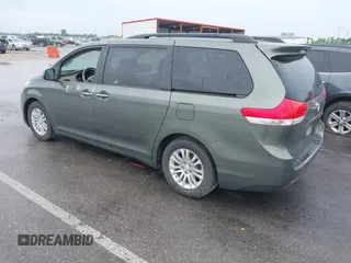 2011 Toyota Sienna XLE AAS with VIN 5TDYK3DC7BS041020, listed as a IAAI auction lot 42218328 with Not Provided miles and . Bid and sale history available at DreamBid. Image 3.