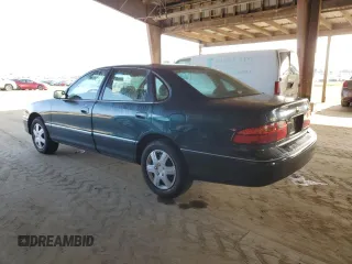 1998 Toyota Avalon XL with VIN 4T1BF18B1WU265039, listed as a Copart auction lot 52356785 with 375,814 mi miles and Salvage Title. Bid and sale history available at DreamBid. Image 2.