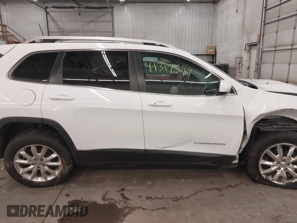 2016 Jeep Cherokee Limited z VIN 1C4PJMDS7GW250969, wystawiony jako IAAI lot #41317399 z przebiegiem 118 598 mil mil oraz . Historia ofert i sprzedaży dostępna na DreamBid. Obrazek 14.