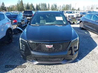 2024 Cadillac XT4 AWD Sport with VIN 1GYFZFR44RF198384, listed as a IAAI auction lot 41691257 with 5,400 mi miles and . Bid and sale history available at DreamBid. Image 12.