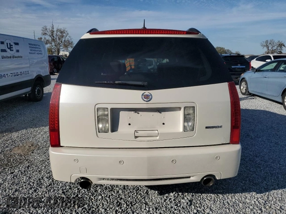 2009 Cadillac SRX RWD z VIN 1GYEE637590113453, wystawiony jako Copart lot #42596675 z przebiegiem 115 118 mil mil oraz Szkoda całkowita • Salvage title. Historia ofert i sprzedaży dostępna na DreamBid. Obrazek 6.