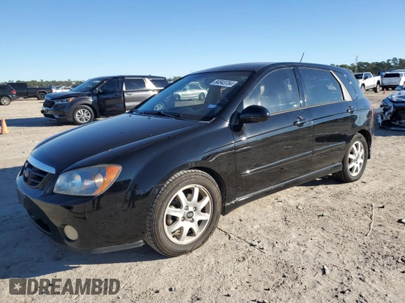 2005 Kia Spectra with VIN KNAFE161355073968, listed as a Copart auction lot 84543784 with 166,858 mi miles and Salvage Title. Bid and sale history available at carsss.com. Image 1.