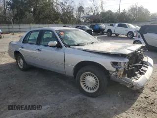 2002 Mercury Grand Marquis LS Premium with VIN 2MEFM75W62X642522, listed as a Copart auction lot 47744225 with 118,318 mi miles and Salvage Title. Bid and sale history available at DreamBid. Image 4.
