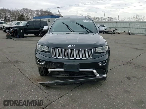2015 Jeep Grand Cherokee Summit with VIN 1C4RJFJG2FC913658, listed as a Copart auction lot 52160035 with 138,008 mi miles and Salvage Title. Bid and sale history available at DreamBid. Image 12.