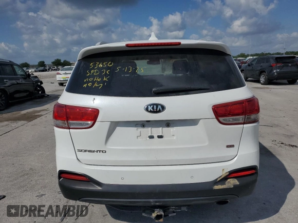 2017 Kia Sorento LX z VIN 5XYPG4A34HG220340, wystawiony jako Copart lot #57467775 z przebiegiem 144 612 mil mil oraz Szkoda całkowita • Salvage title. Historia ofert i sprzedaży dostępna na DreamBid. Obrazek 6.