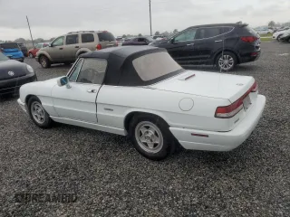 1991 Alfa Romeo Spider z VIN ZARBB32G8M6005213, wystawiony jako Copart lot #74077224 z przebiegiem Nie podano mil oraz Nie do naprawy. Historia ofert i sprzedaży dostępna na DreamBid. Obrazek 2.
