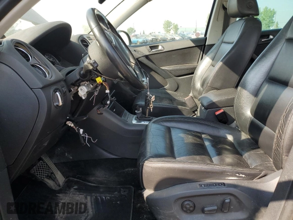 2011 Volkswagen Tiguan SEL with VIN WVGBV7AX1BW504132, listed as a Copart auction lot 64467484 with Not Provided miles and Salvage Title. Bid and sale history available at DreamBid. Image 7.
