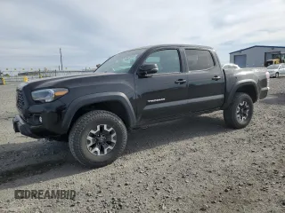 2020 Toyota Tacoma SR5 z VIN 3TMCZ5ANXLM354569, wystawiony jako Copart lot #56219685 z przebiegiem 54 707 mil mil oraz Szkoda całkowita • Salvage title. Historia ofert i sprzedaży dostępna na DreamBid. Obrazek 1.