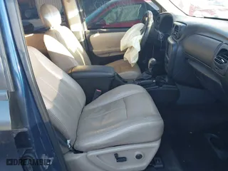 2005 Chevrolet TrailBlazer LS with VIN 1GNET16S556117614, listed as a IAAI auction lot 41320947 with 177,726 mi miles. Bid and sale history available at carsss.com. Image 4.