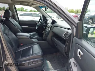 2013 Honda Pilot EX-L with VIN 5FNYF3H51DB002883, listed as a IAAI auction lot 42145649 with 223,901 mi miles. Bid and sale history available at carsss.com. Image 5.