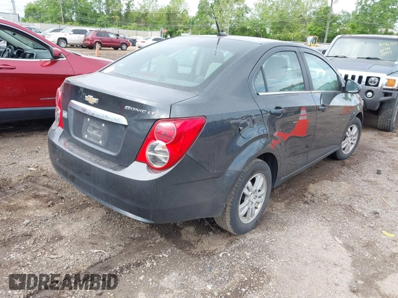 2014 Chevrolet Sonic LT with VIN 1G1JC5SH8E4235864, listed as a IAAI auction lot 42247217 with 150,057 mi miles and . Bid and sale history available at DreamBid. Image 4.