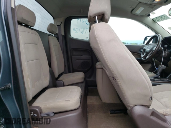 2015 GMC Canyon 2WD SLE with VIN 1GTH5BEA7F1158758, listed as a Copart auction lot 63617524 with 102,744 mi miles and Salvage Title. Bid and sale history available at carsss.com. Image 10.
