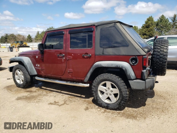 2008 Jeep Wrangler Unlimited X with VIN 1J8GA391X8L592843, listed as a Copart auction lot 53047215 with 239,726 mi miles and Salvage Title. Bid and sale history available at DreamBid. Image 2.