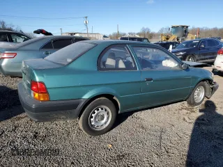 1996 Toyota Tercel DX z VIN JT2AC52L6T0170537, wystawiony jako Copart lot #42576525 z przebiegiem 66 926 mil mil oraz Szkoda całkowita • Salvage title. Historia ofert i sprzedaży dostępna na DreamBid. Obrazek 3.