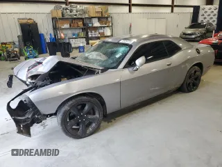 2014 Dodge Challenger R/T Plus z VIN 2C3CDYBT5EH302253, wystawiony jako Copart lot #73976724 z przebiegiem Nie podano mil oraz Szkoda całkowita • Salvage title. Historia ofert i sprzedaży dostępna na DreamBid. Obrazek 1.