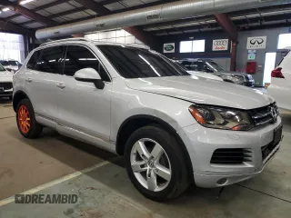 2012 Volkswagen Touareg Exec with VIN WVGEF9BP9CD009937, listed as a Copart auction lot 84596364 with 97,431 mi miles and Clean Title. Bid and sale history available at DreamBid. Image 4.