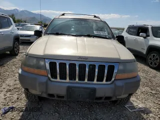2000 Jeep Grand Cherokee Laredo with VIN 1J4GW48S6YC304447, listed as a Copart auction lot 58001035 with Not provided miles and Clean title. Bid and sale history available at DreamBid. Image 5.