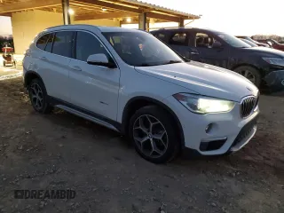 2017 BMW X1 sDrive28i with VIN WBXHU7C37H5H34418, listed as a Copart auction lot 47982795 with 67,980 mi miles and Salvage Title. Bid and sale history available at carsss.com. Image 4.
