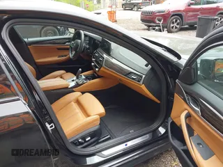 2018 BMW 5 Series 540i xDrive with VIN WBAJE7C58JG891098, listed as a IAAI auction lot 42331320 with 55,172 mi miles and . Bid and sale history available at DreamBid. Image 5.