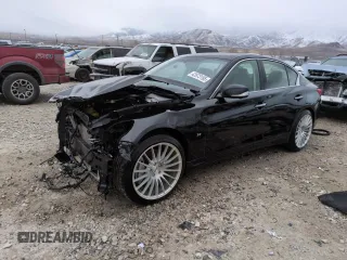 2015 Infiniti Q50 Premium with VIN JN1BV7AR6FM393409, listed as a Copart auction lot 42973195 with 104,812 mi miles and Salvage Title. Bid and sale history available at carsss.com. Image 1.