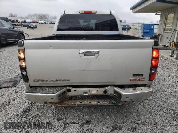 2012 GMC Canyon SLE1 with VIN 1GTD5MF9XC8156116, listed as a Copart auction lot 87413134 with 207,874 mi miles and Salvage Title. Bid and sale history available at carsss.com. Image 6.