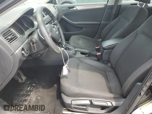2015 Volkswagen Jetta SE with VIN 3VWD17AJ1FM349301, listed as a Copart auction lot 58963255 with 156,480 mi miles and Salvage title. Bid and sale history available at DreamBid. Image 7.