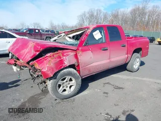 2006 Dodge Dakota SLT with VIN 1D7HE48K76S505943, listed as a IAAI auction lot 41410318 with 224,123 mi miles and . Bid and sale history available at carsss.com. Image 2.